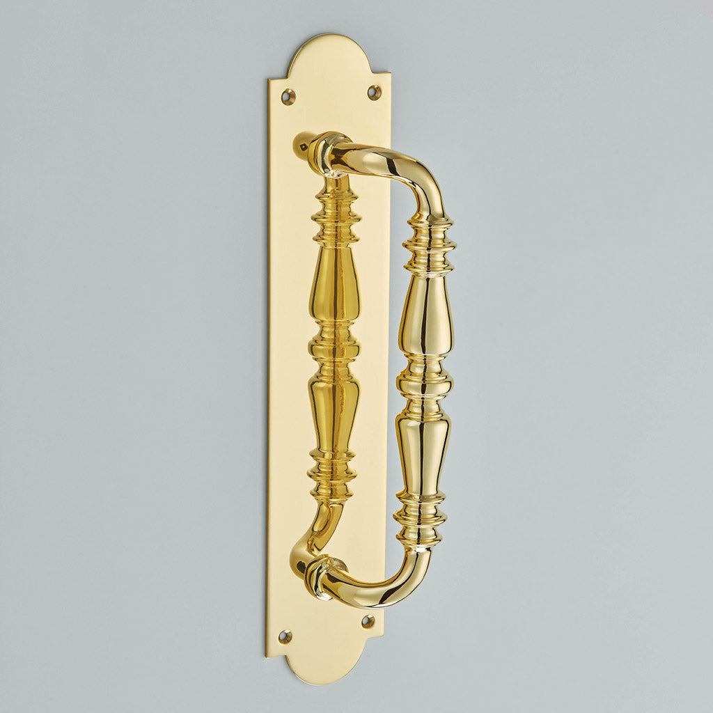 Ornate Pull Handle On Shaped Plate