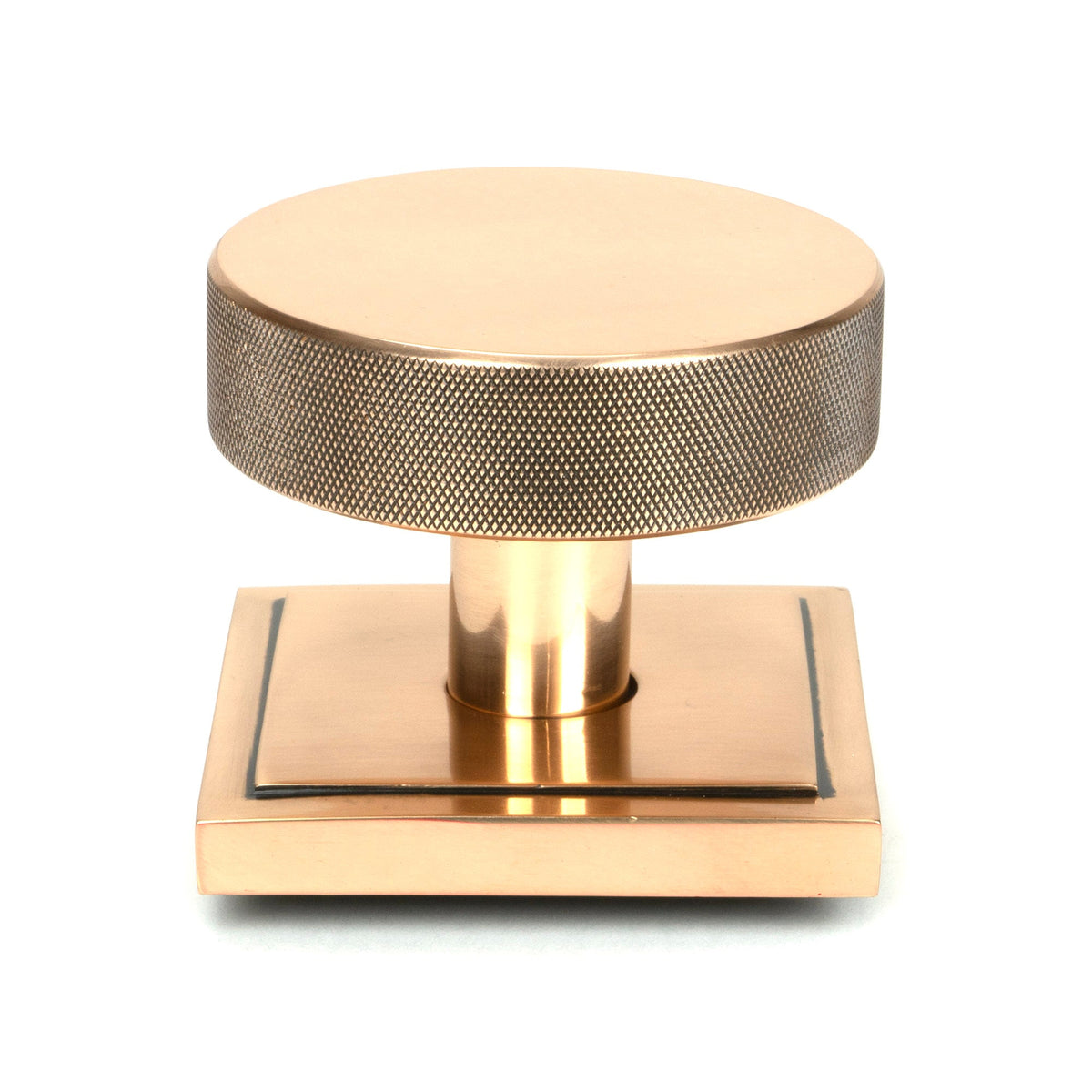 From The Anvil's Polished Bronze Brompton Centre Door Knob