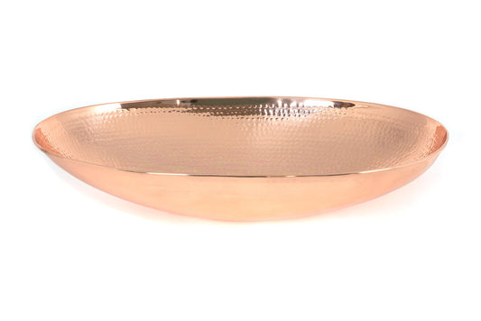 From The Anvil's Hammered Copper Oval basin