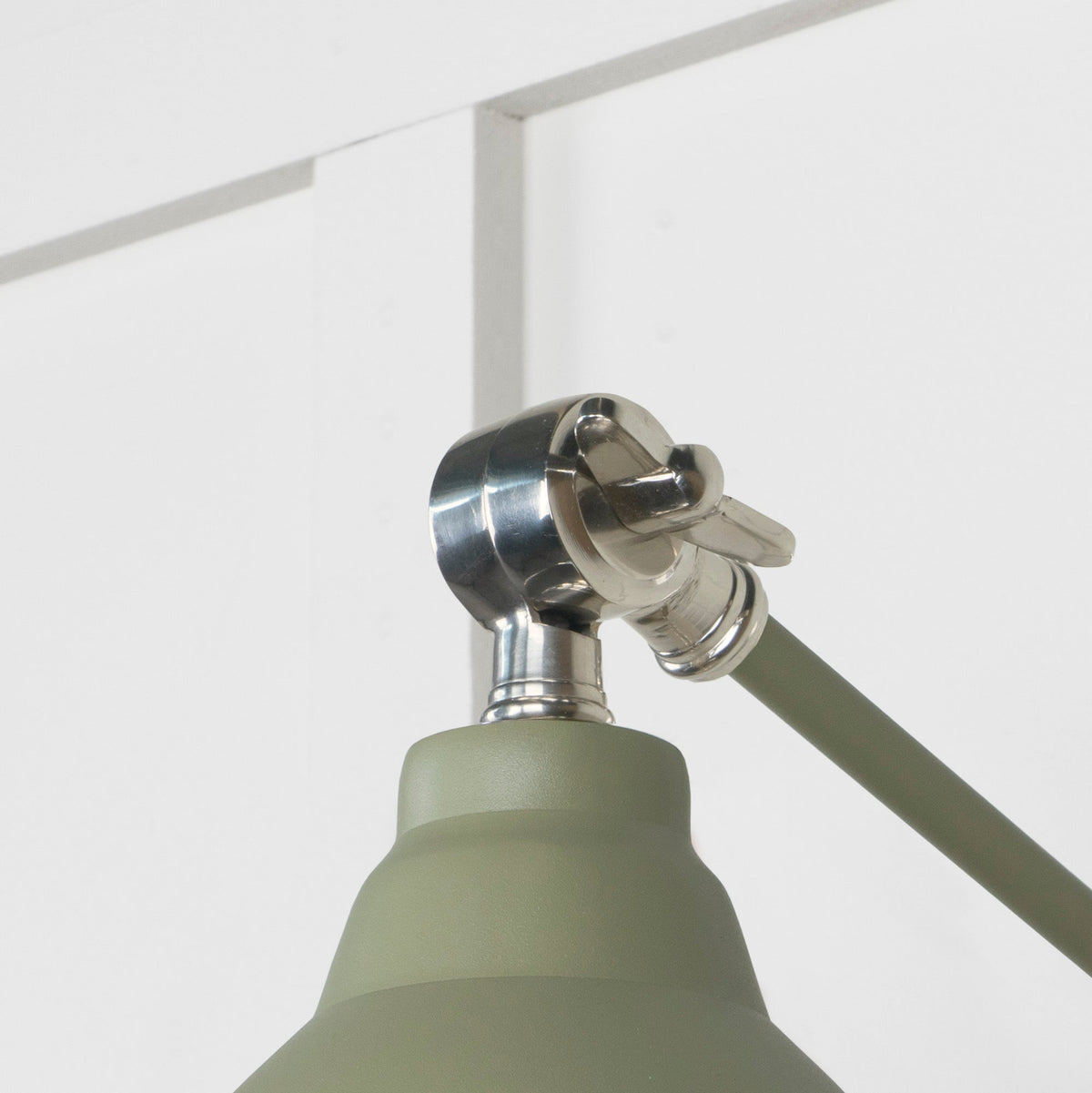 Hammered Nickel Brindley Wall Light by From The Anvil