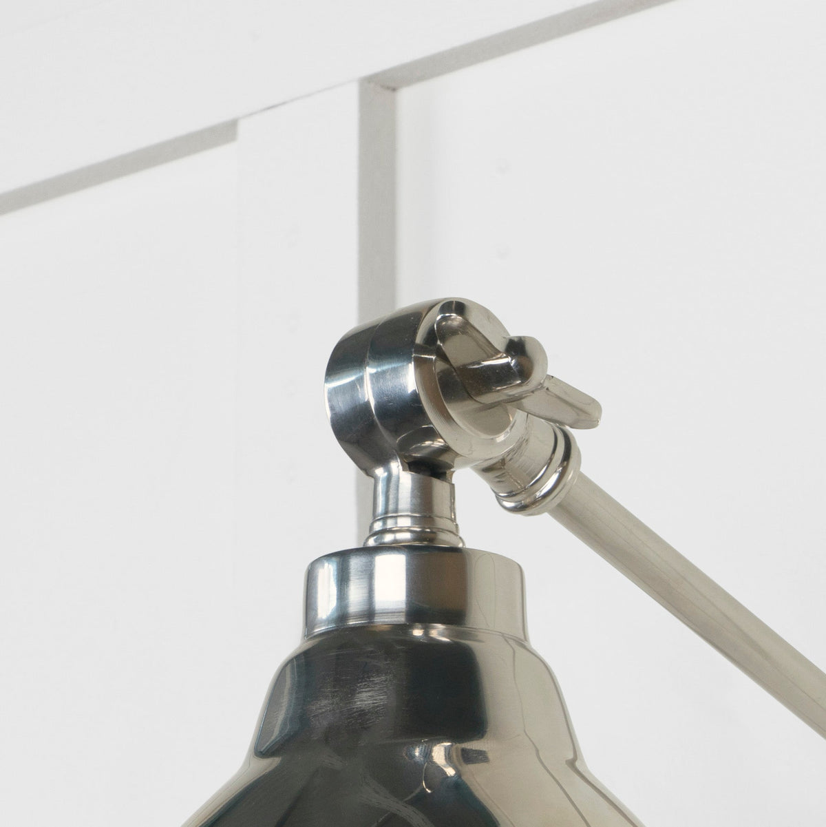 Hammered Nickel Brindley Wall Light by From The Anvil