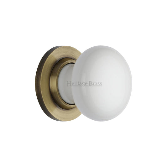 Plain White Porcelain Door Knob on Rose by M Marcus - Heritage Brass