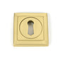 From The Anvil's Satin Brass Round Escutcheon