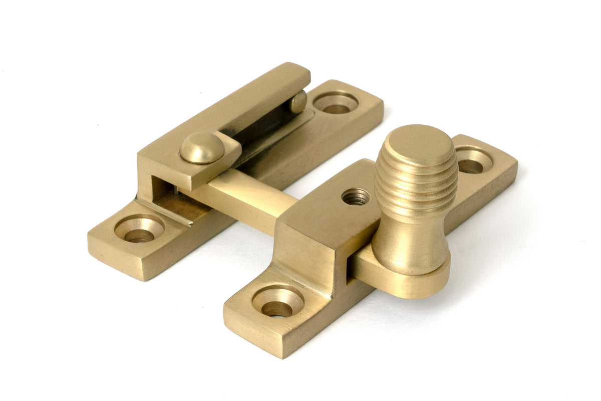 From The Anvil's Satin Brass Beehive Quadrant Fastener - Narrow