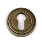 From The Anvil's Burnished Brass Round Euro Escutcheon