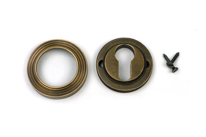 Round Euro Escutcheon by From The Anvil