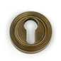 From The Anvil's Burnished Brass Round Euro Escutcheon
