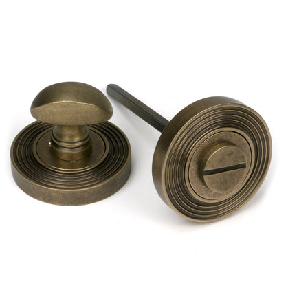 From The Anvil's Burnished Brass Concealed Round Thumbturn Set