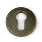 From The Anvil's Burnished Brass Regency Concealed Escutcheon
