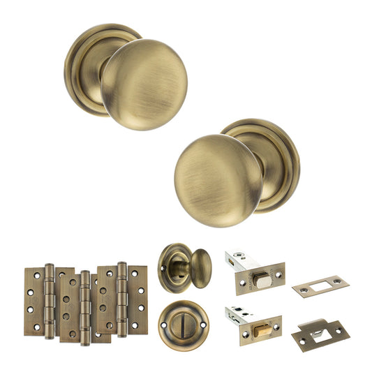 Old English Harrogate Door Knob Pack (Bathroom Set - 4" Deadbolt, 4" Fire Rated Hinges x3) - Antique Brass - Default