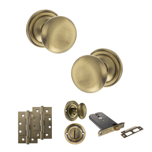 Old English Harrogate Door Knob Pack (Lock Set - Horizontal Bathlock, 4" Slim Knuckle Hinges x2) - Antique Brass - Default
