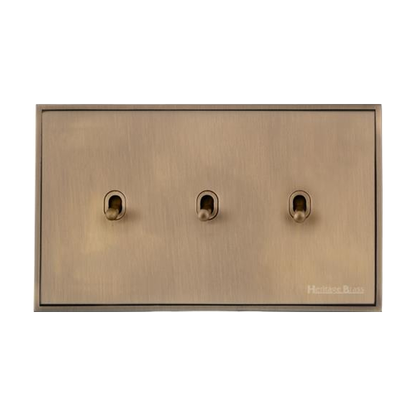 Executive Range Antique Brass Switches & Sockets, EX91 - 3 Gang Stockholm Toggle by Heritage Brass By M-Marcus