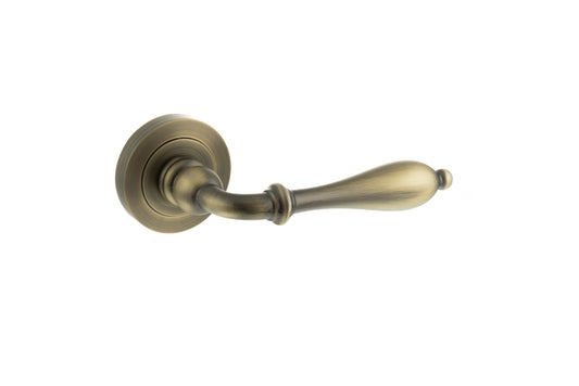 Old English Wrexham Lever Door Handle on Round Rose - Matt Antique Brass - Default