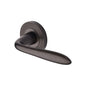 Sutton Reeded Door Handle on Round Rose by M Marcus - Heritage Brass