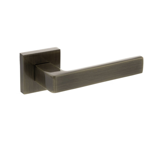 STATUS Montana Lever Door Handle on S4 Square Rose - Antique Brass - Depth: 54mm, Height: 52mm, Width: 143mm