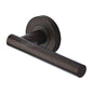 Shuttle Door Handle on Round Rose by M Marcus - Heritage Brass