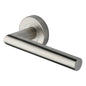 Athena Door Handle on Round Rose by M Marcus - Heritage Brass