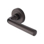 Octave Door Handle on Round Rose by M Marcus - Heritage Brass