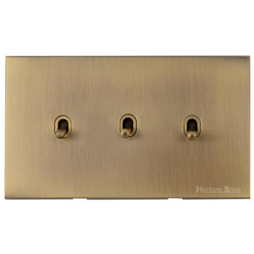 Winchester Range Antique Brass Switches & Sockets, W91 - 3 Gang Stockholm Toggle by Heritage Brass By M-Marcus