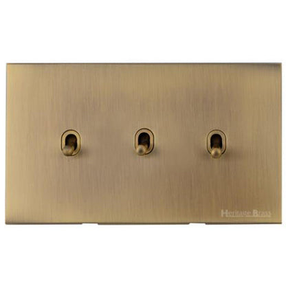 Winchester Range Antique Brass Switches & Sockets, W91 - 3 Gang Stockholm Toggle by Heritage Brass By M-Marcus