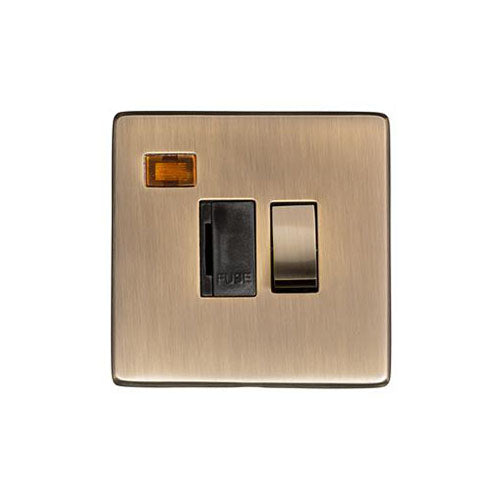 Studio Range Antique Brass Switches & Sockets, Y91 - Switched Spur with Neon (13 Amp) by Heritage Brass By M-Marcus