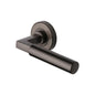 Bauhaus Door Handle on Round Rose by M Marcus - Heritage Brass